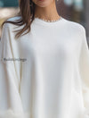 elegant-faux-fur-trimmed-knit-sweater