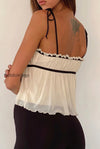 solid-ruffle-hem-tie-bow-cami-top